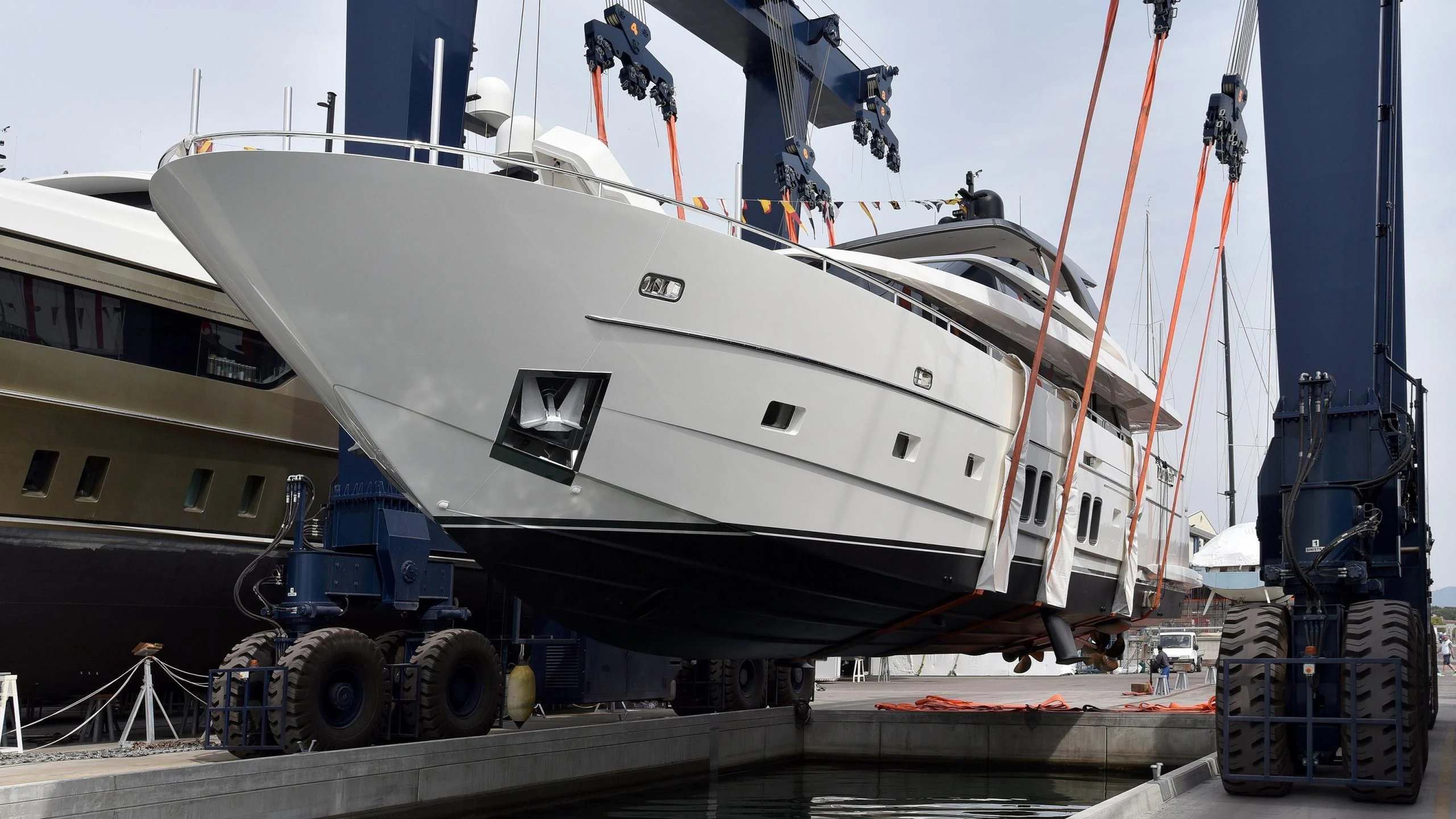 a large white boat docked aboard FRIDAY Yacht for Sale
