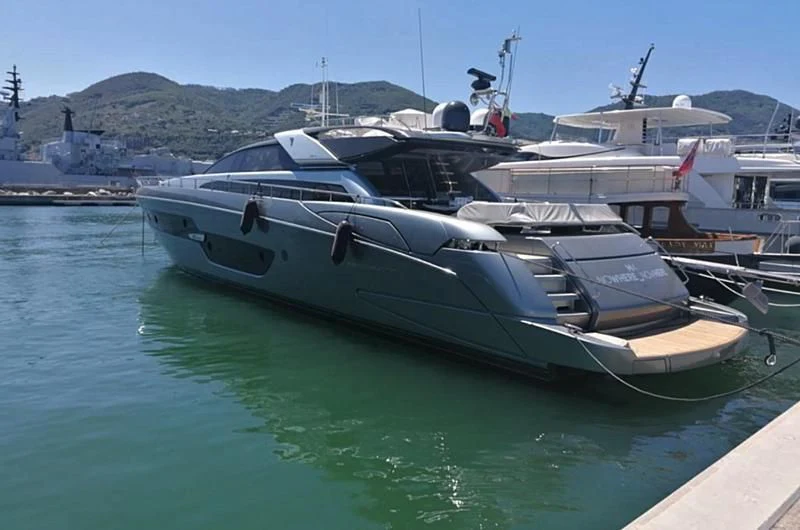 a boat docked at a pier aboard NOWHERE NOWHERE Yacht for Sale