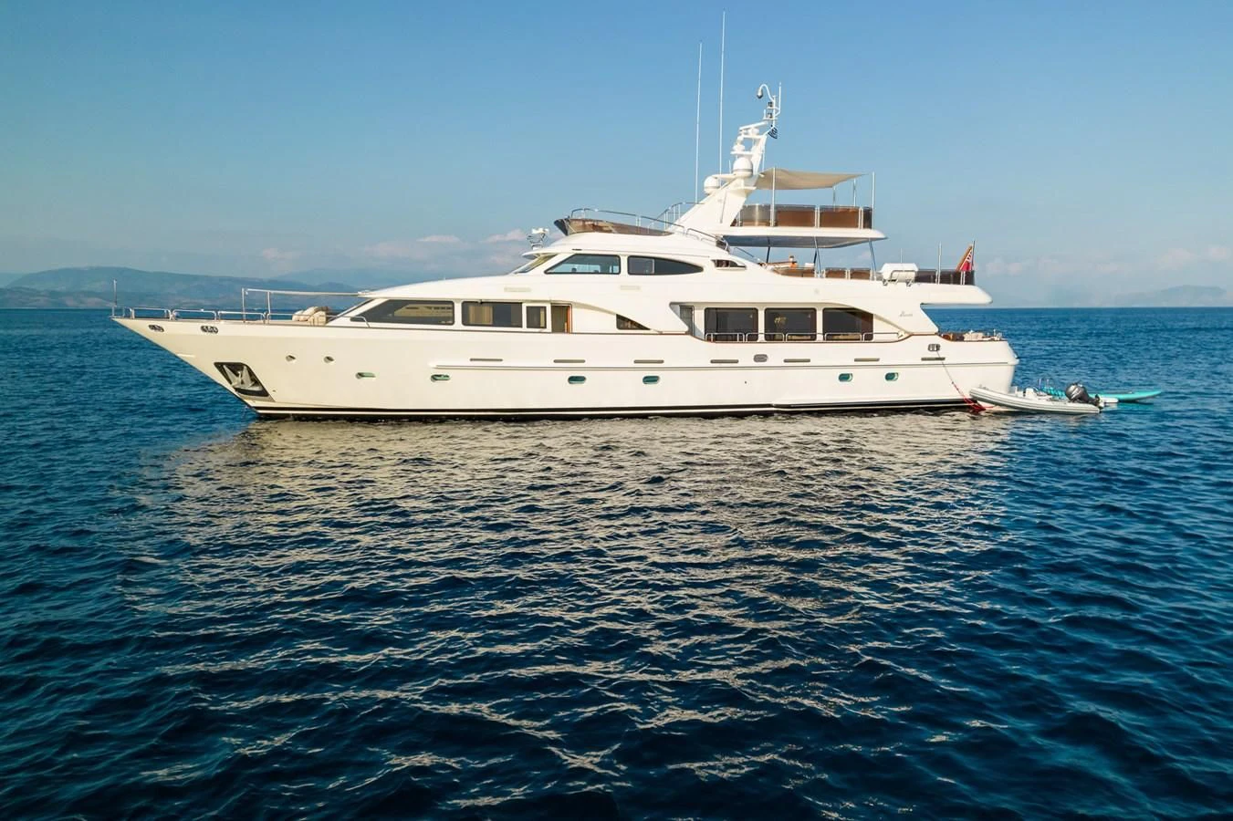 a white boat in the water aboard ENDLESS SUMMER Yacht for Sale