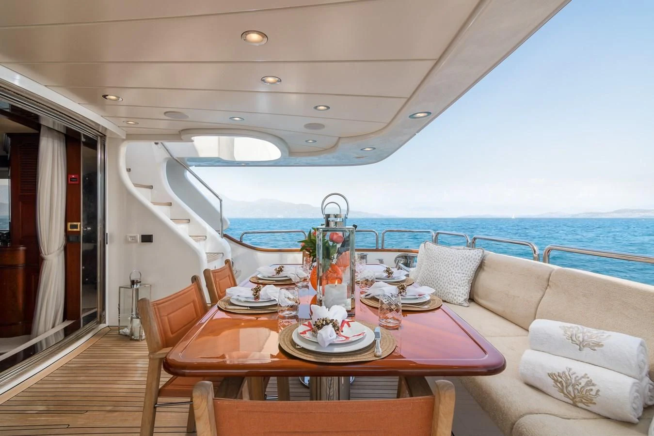 a table set for a meal on a boat aboard ENDLESS SUMMER Yacht for Sale