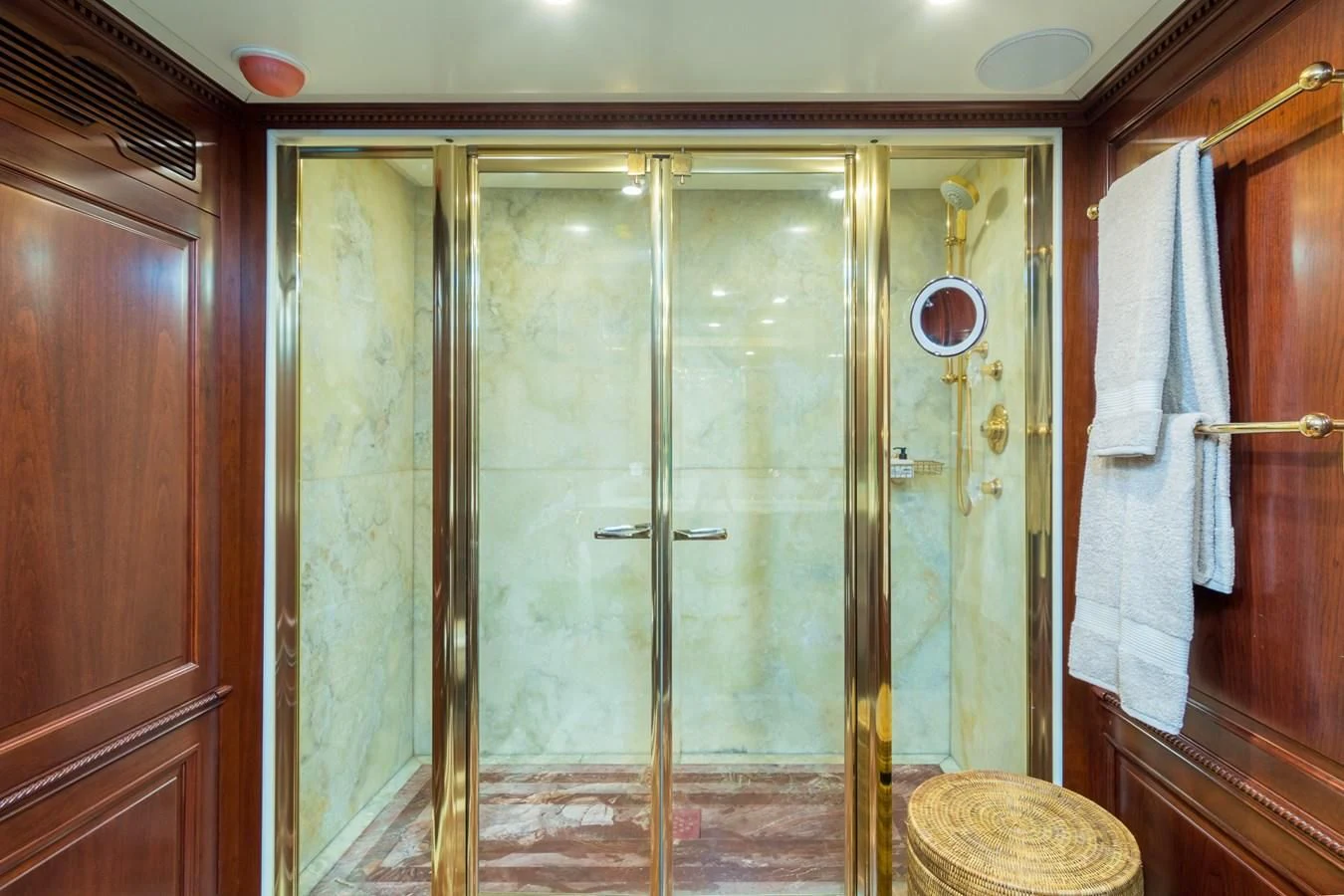a bathroom with a glass shower aboard ENDLESS SUMMER Yacht for Sale