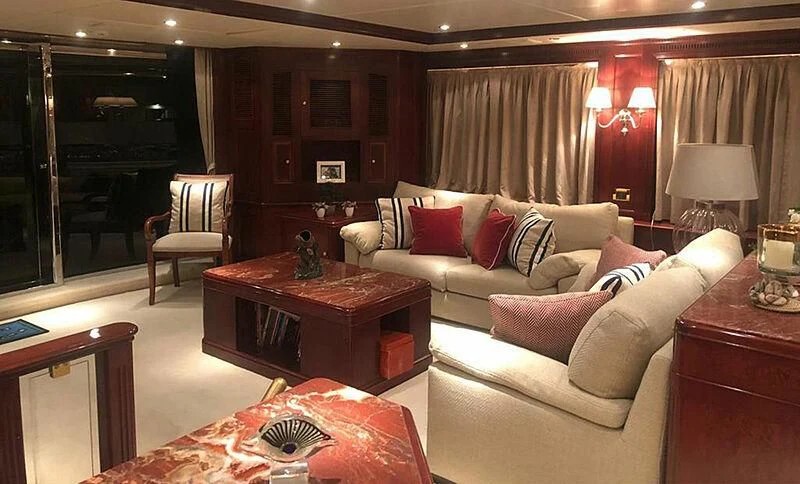 a living room with a couch and a table aboard ENDLESS SUMMER Yacht for Sale