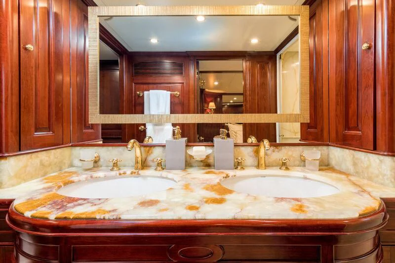 a bathroom with a large mirror aboard ENDLESS SUMMER Yacht for Sale