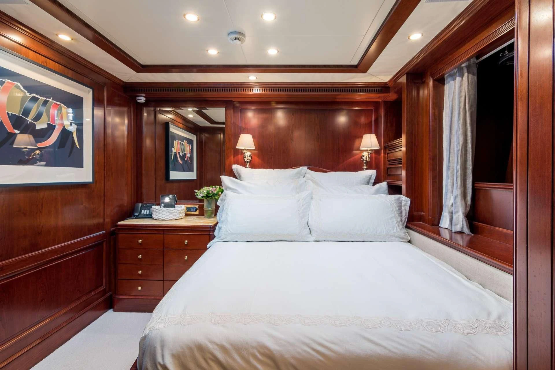 a bed with white sheets aboard ENDLESS SUMMER Yacht for Sale