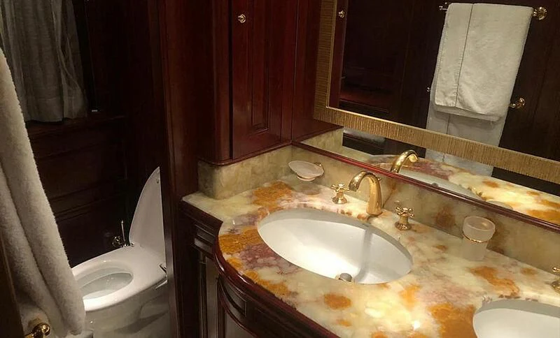 a bathroom with a sink and a toilet aboard ENDLESS SUMMER Yacht for Sale