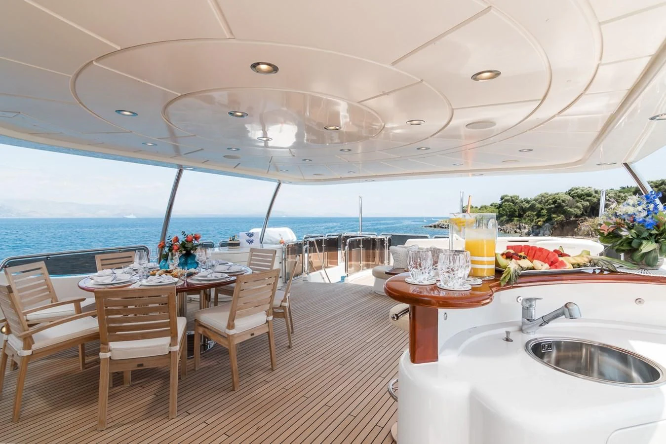 a room with a table and chairs aboard ENDLESS SUMMER Yacht for Sale
