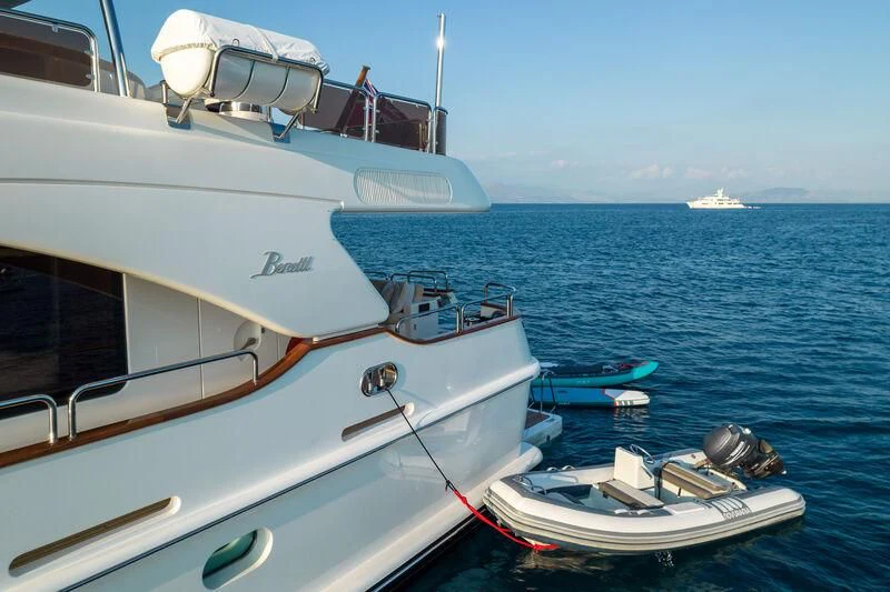 a boat is parked on the side of the water aboard ENDLESS SUMMER Yacht for Sale