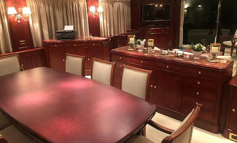 a large table with a glass of beer on it aboard ENDLESS SUMMER Yacht for Sale