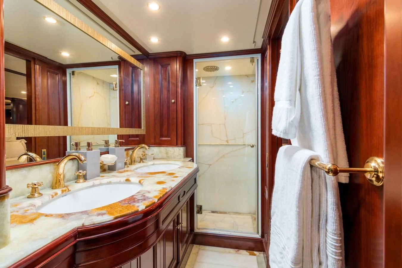 a bathroom with a sink and a mirror aboard ENDLESS SUMMER Yacht for Sale