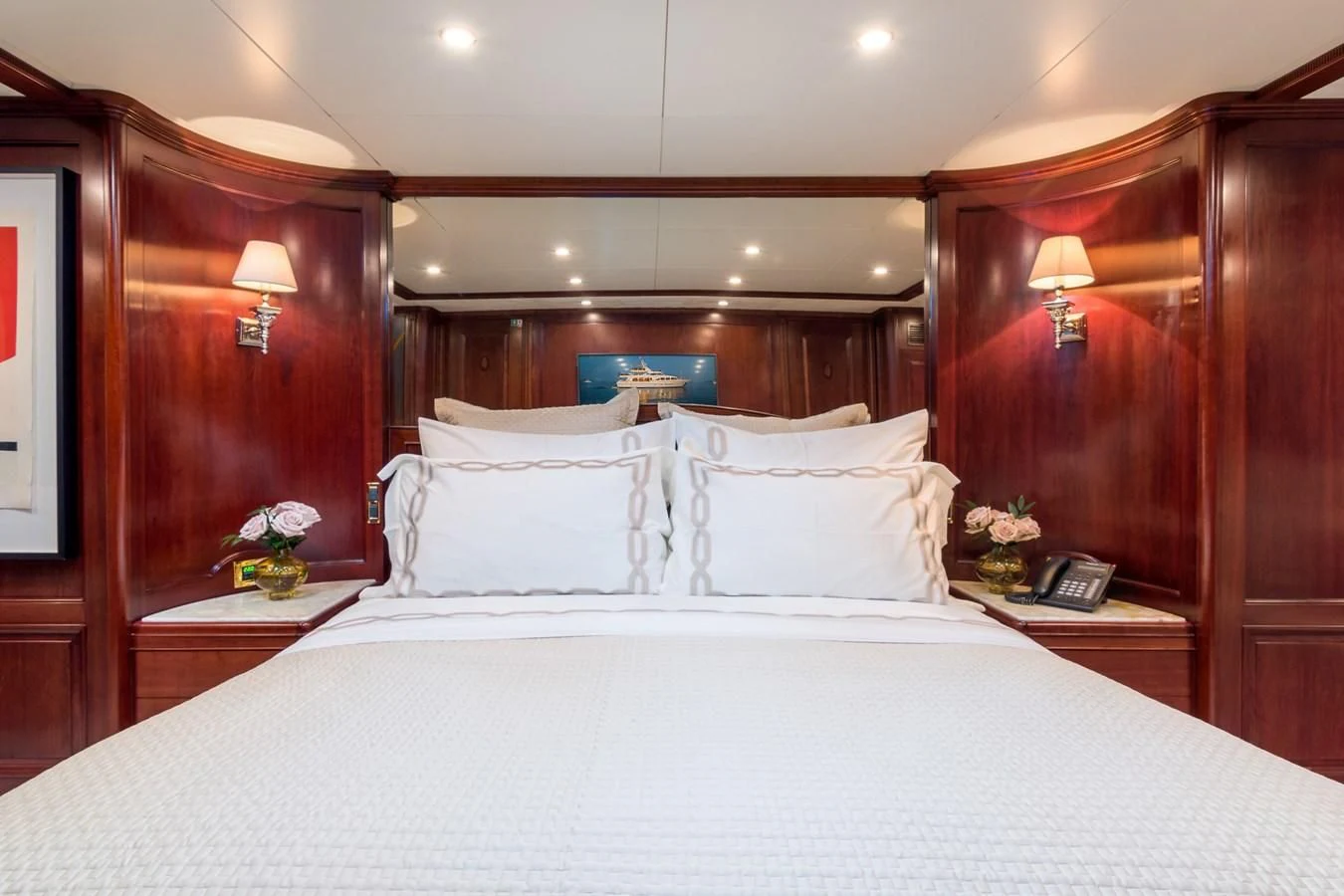 a bed with white sheets aboard ENDLESS SUMMER Yacht for Sale