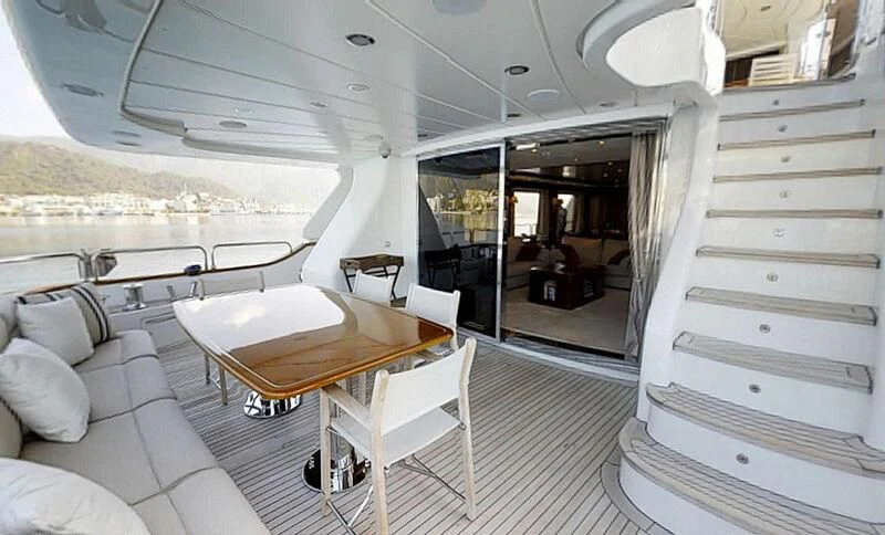 a boat with a table and chairs aboard ENDLESS SUMMER Yacht for Sale