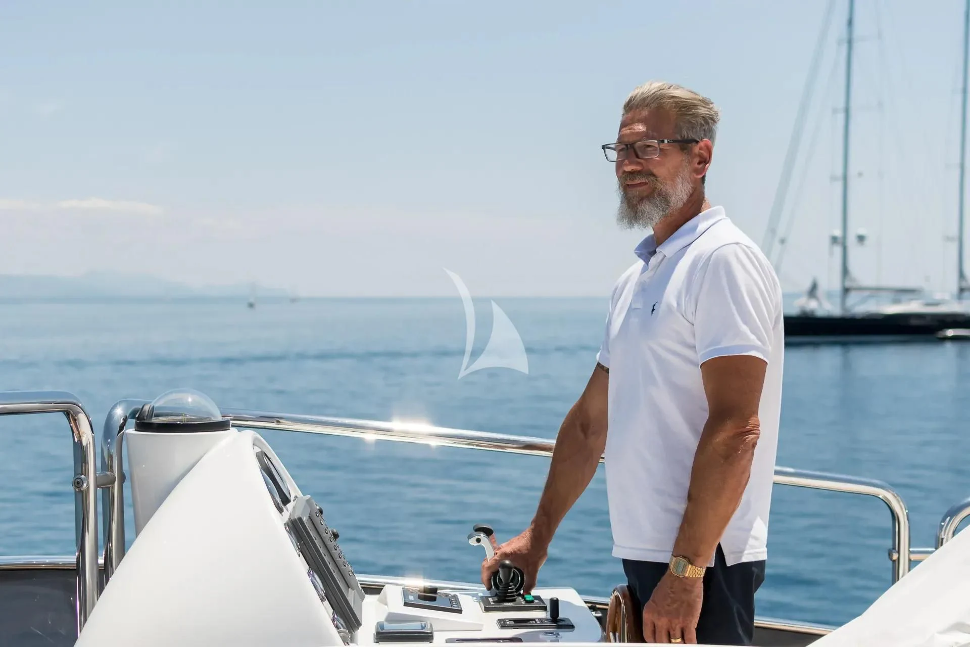a man standing on a boat aboard ENDLESS SUMMER Yacht for Sale