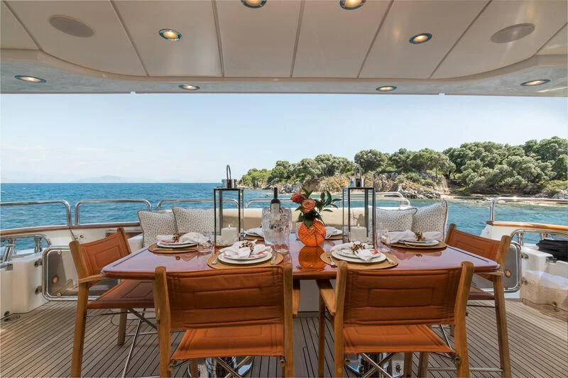 a table set for a meal aboard ENDLESS SUMMER Yacht for Sale