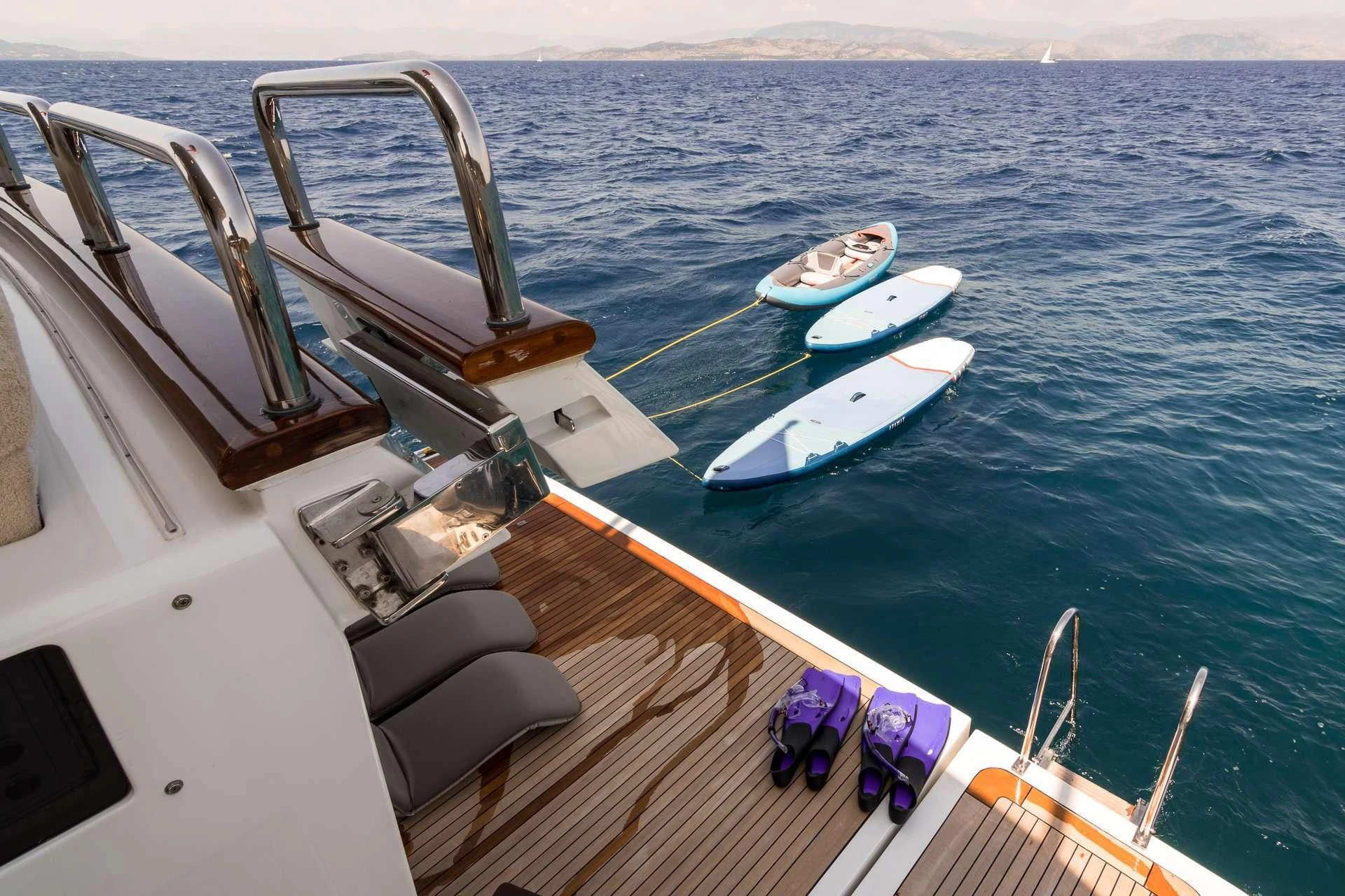 a boat with surfboards on it aboard ENDLESS SUMMER Yacht for Sale