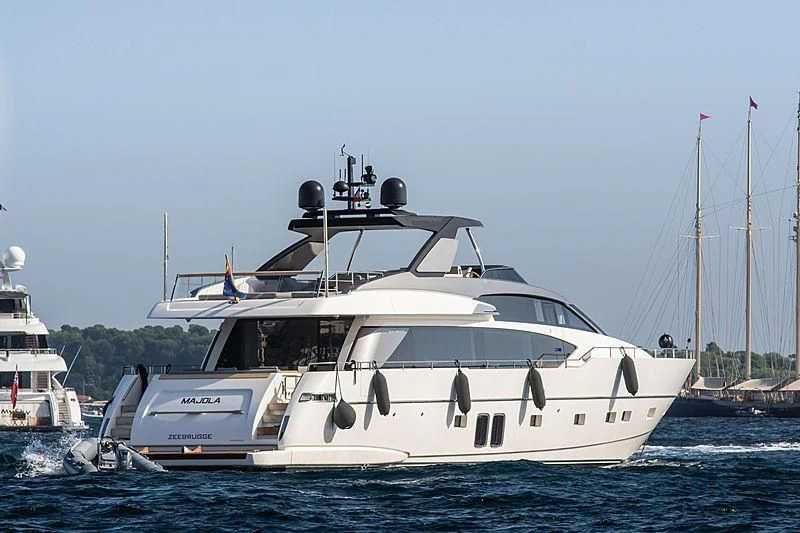 a white yacht in the water aboard SEN Yacht for Sale