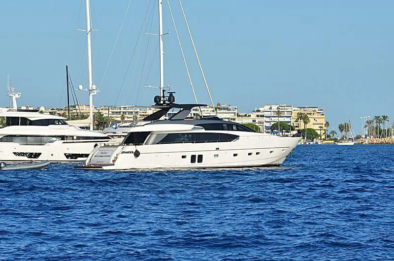 a couple of white yachts in the water aboard SEN Yacht for Sale
