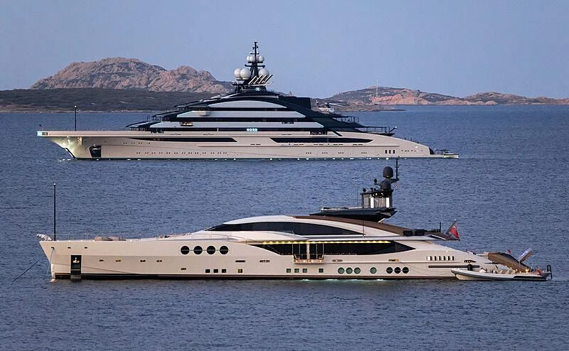 a large ship in the water aboard LADY M Yacht for Sale
