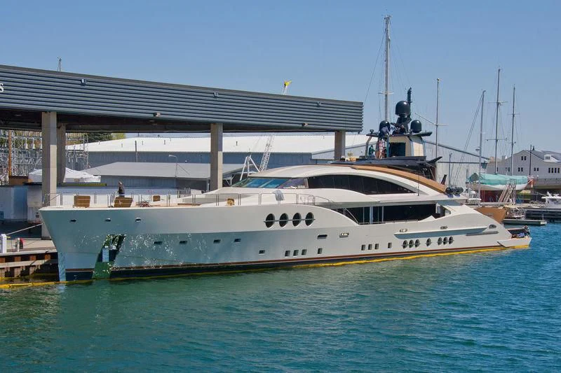 a boat docked at a pier aboard LADY M Yacht for Sale