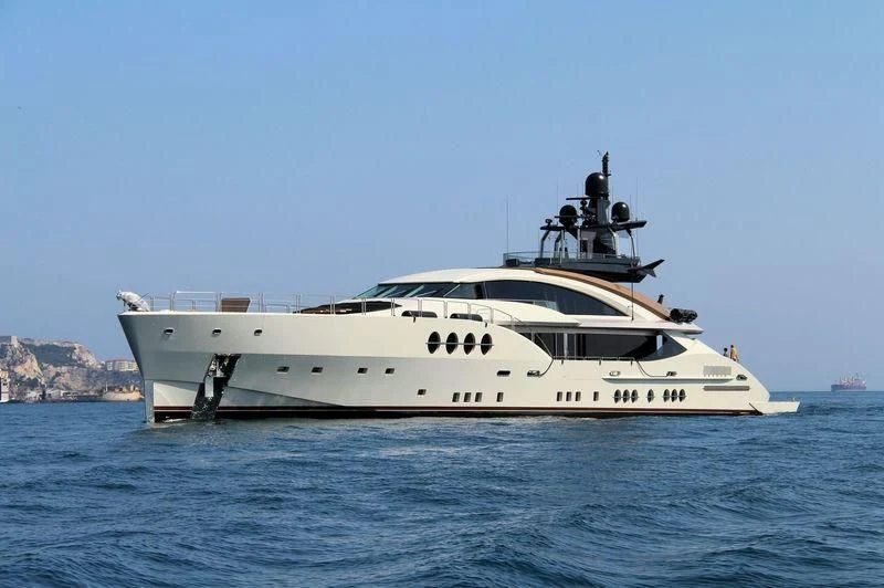 a white yacht in the water aboard LADY M Yacht for Sale