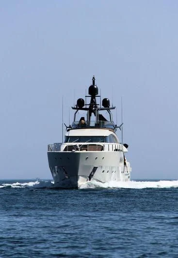 a large ship in the water aboard LADY M Yacht for Sale