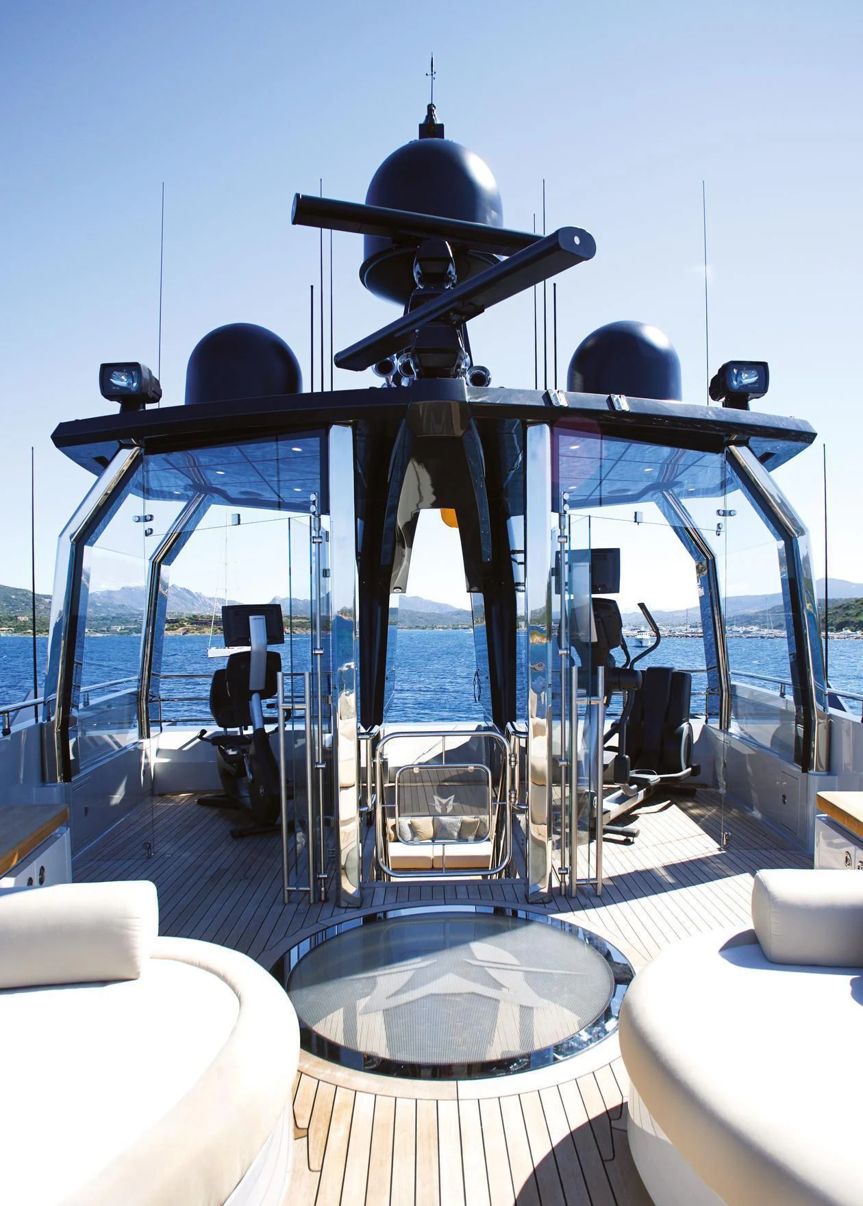 a large black machine on a stand aboard LADY M Yacht for Sale
