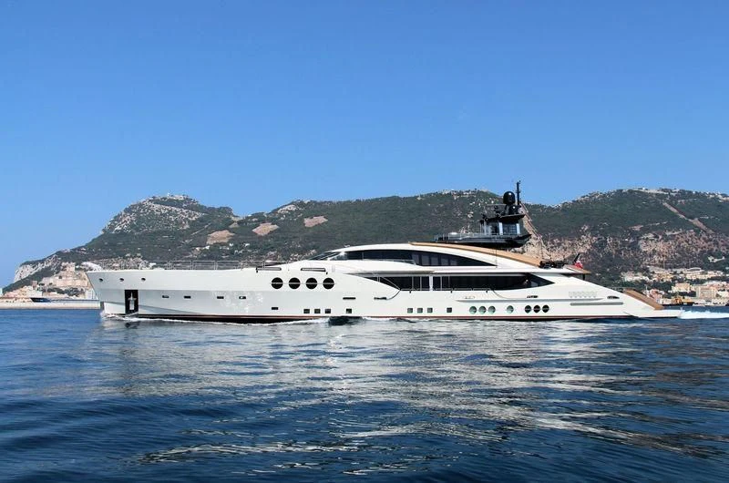 a white yacht in the water aboard LADY M Yacht for Sale