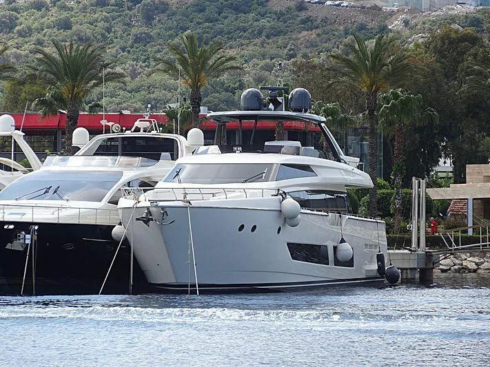 a group of boats are parked in the water aboard FIYET Yacht for Sale