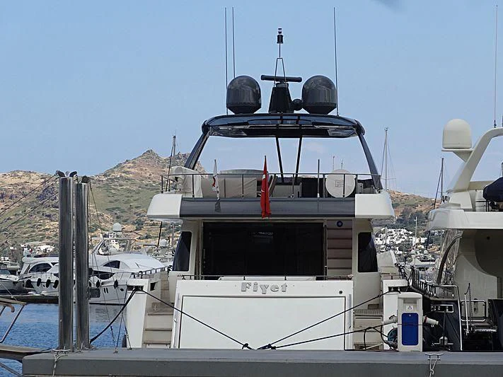 a boat docked at a pier aboard FIYET Yacht for Sale