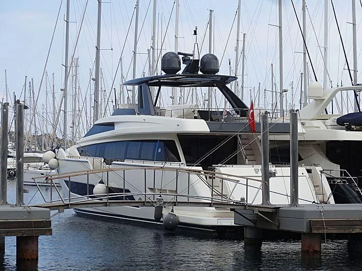 a boat docked at a pier aboard FIYET Yacht for Sale