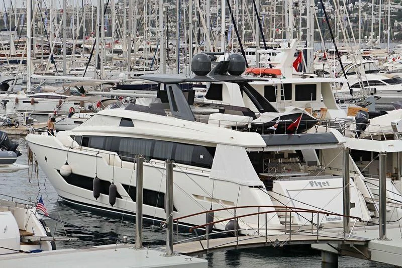 a group of boats are parked in a harbor aboard FIYET Yacht for Sale
