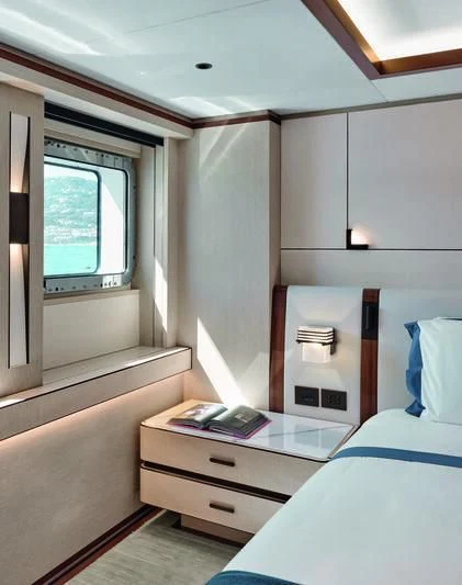a small bedroom with a small desk aboard ZAZOU Yacht for Sale