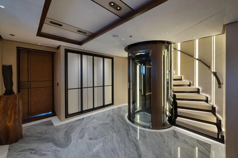 a large room with a glass door aboard ZAZOU Yacht for Sale