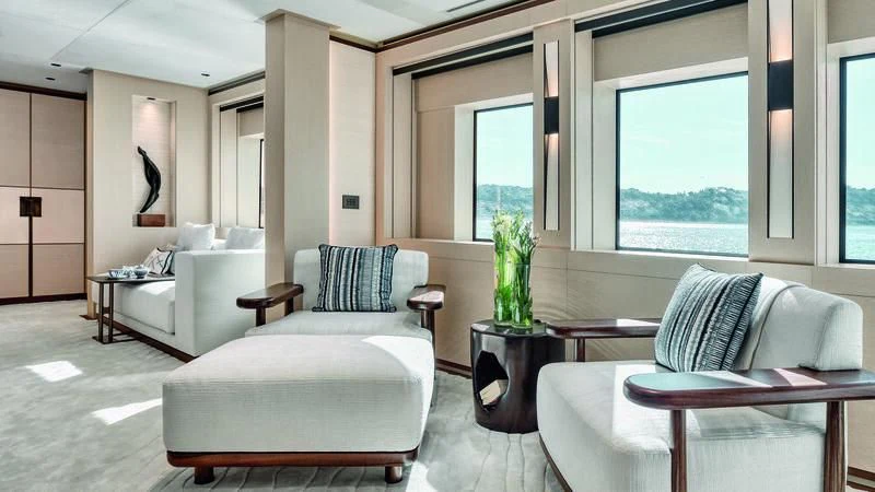 a living room with a couch and a table aboard ZAZOU Yacht for Sale