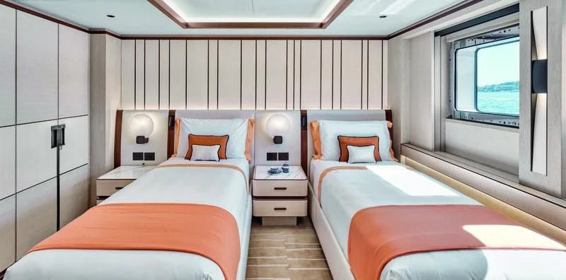 a room with two beds aboard ZAZOU Yacht for Sale