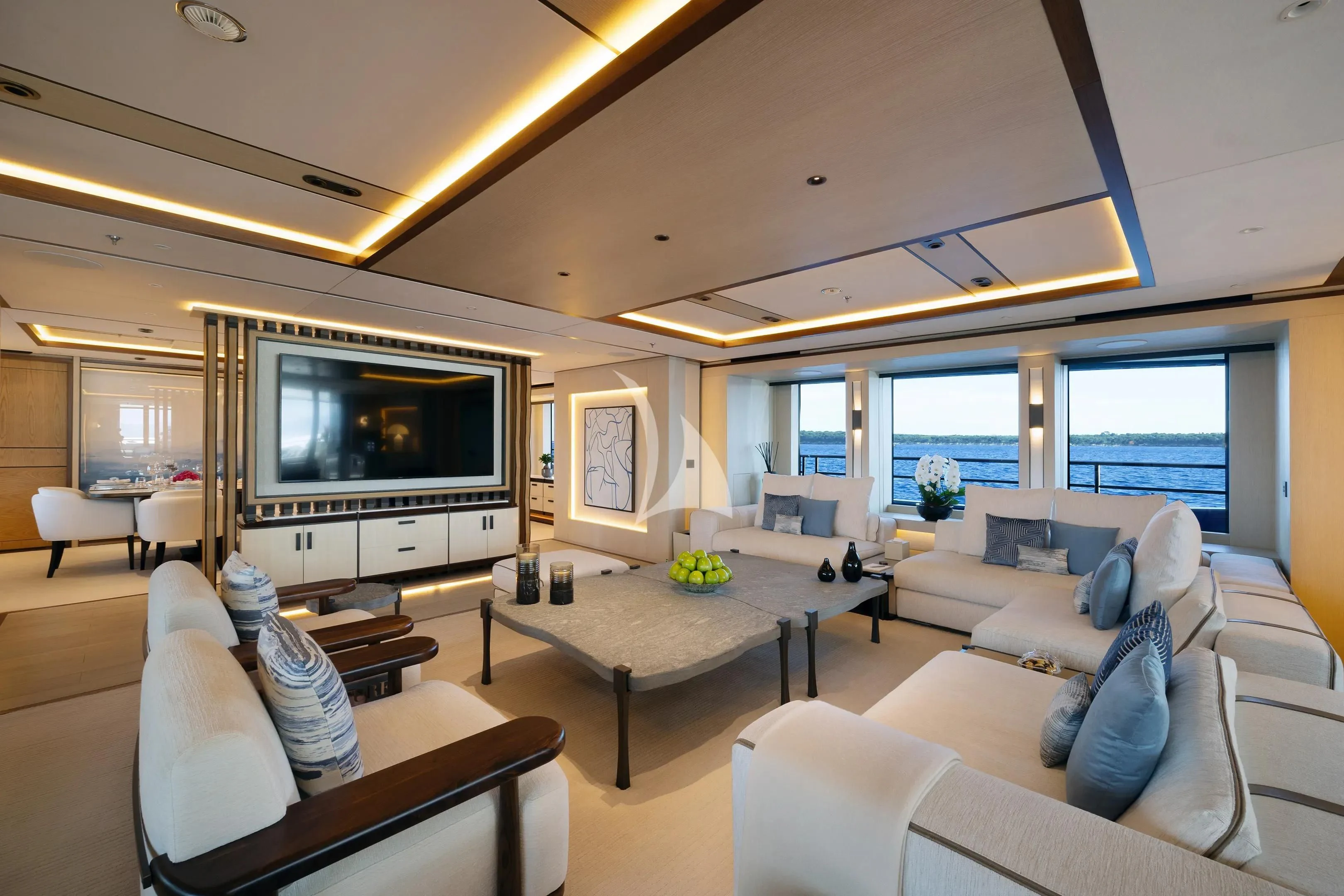 a living room with a large flat screen television and a large window aboard ZAZOU Yacht for Sale