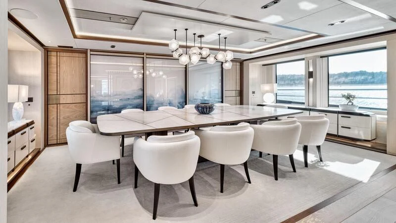 a large kitchen with a large dining table aboard ZAZOU Yacht for Sale