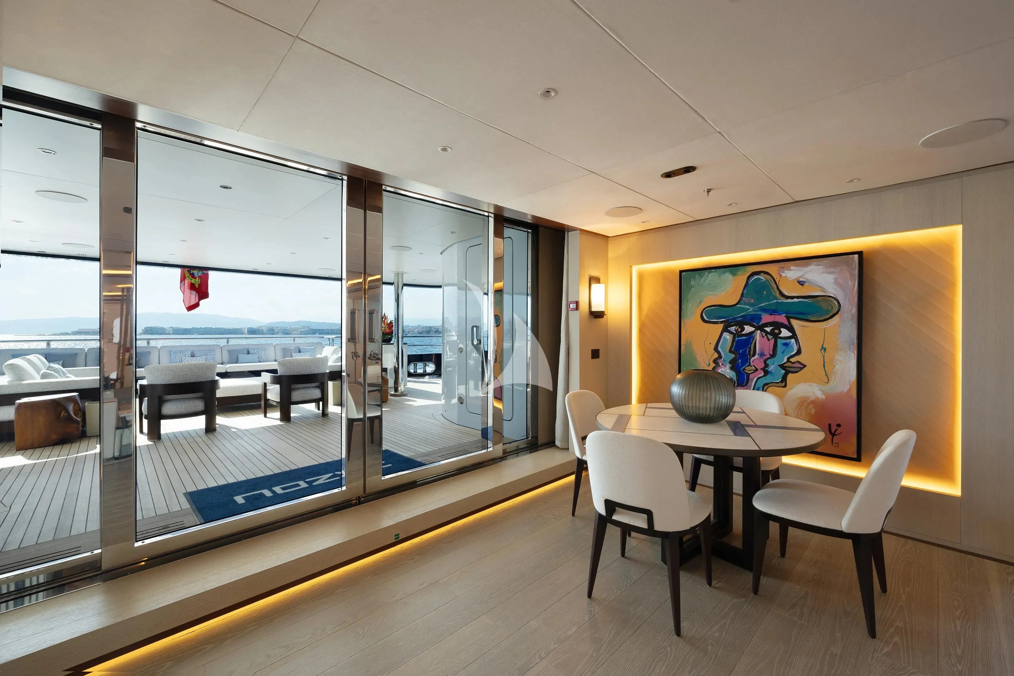 a room with a table and chairs aboard ZAZOU Yacht for Sale