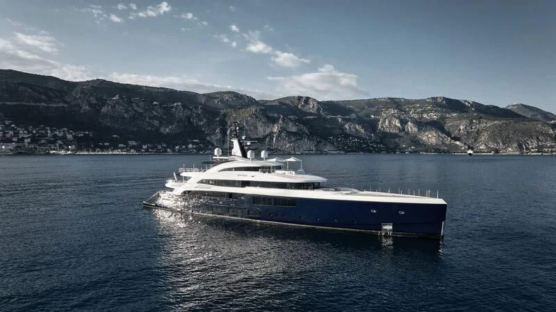 a boat in the water with Lake Mead in the background aboard ZAZOU Yacht for Sale