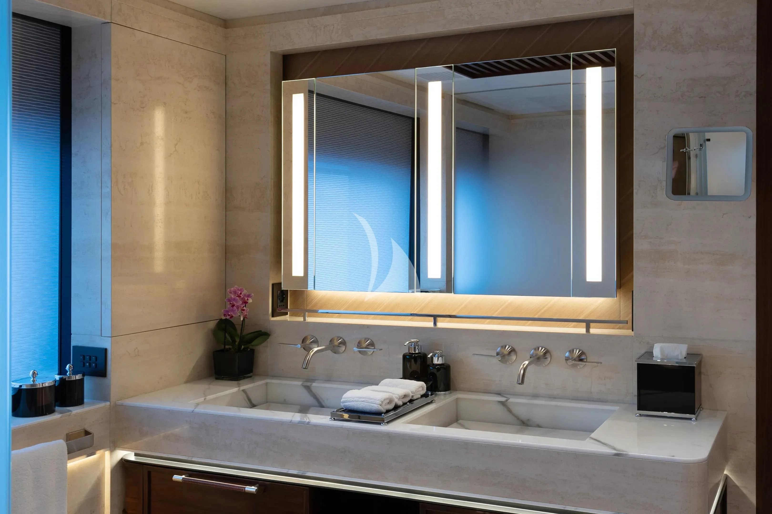 a bathroom with a large mirror aboard ZAZOU Yacht for Sale