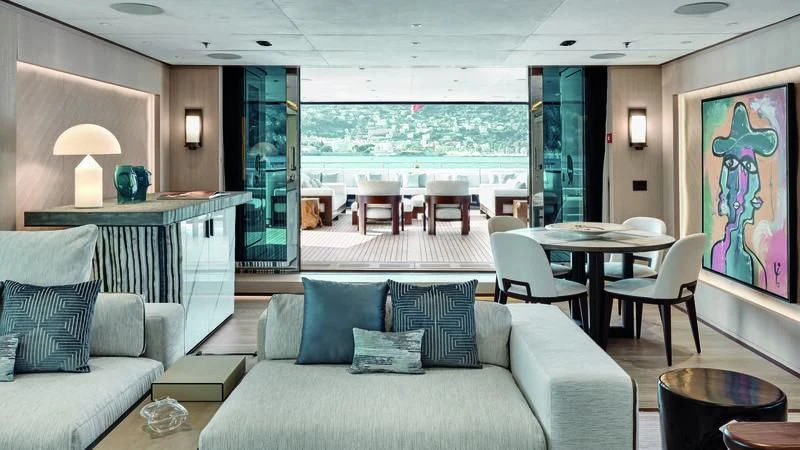 a living room with a couch and a table aboard ZAZOU Yacht for Sale