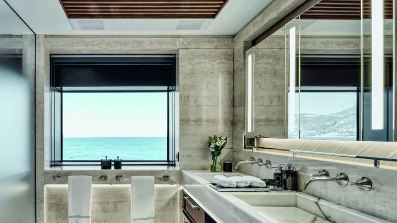 a bathroom with a large window aboard ZAZOU Yacht for Sale