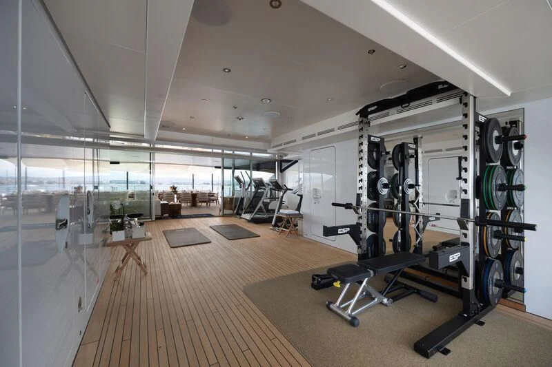 a room with exercise equipment aboard ZAZOU Yacht for Sale