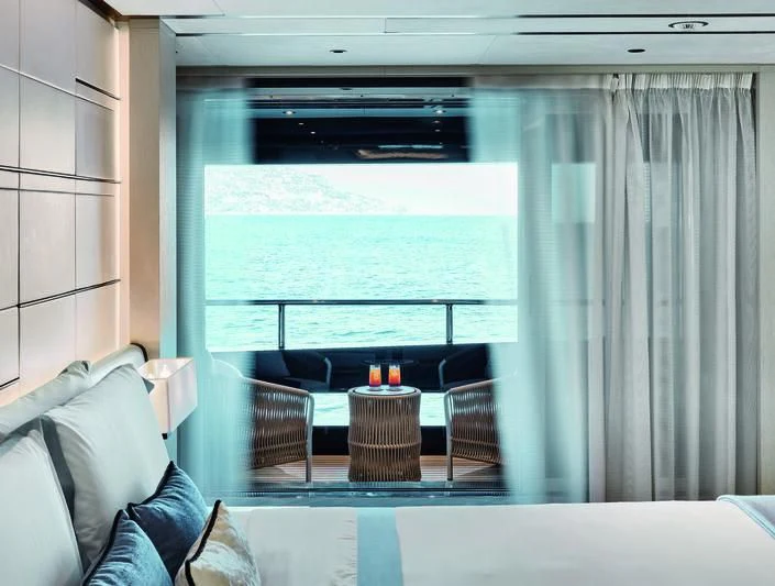a room with a table and chairs aboard ZAZOU Yacht for Sale