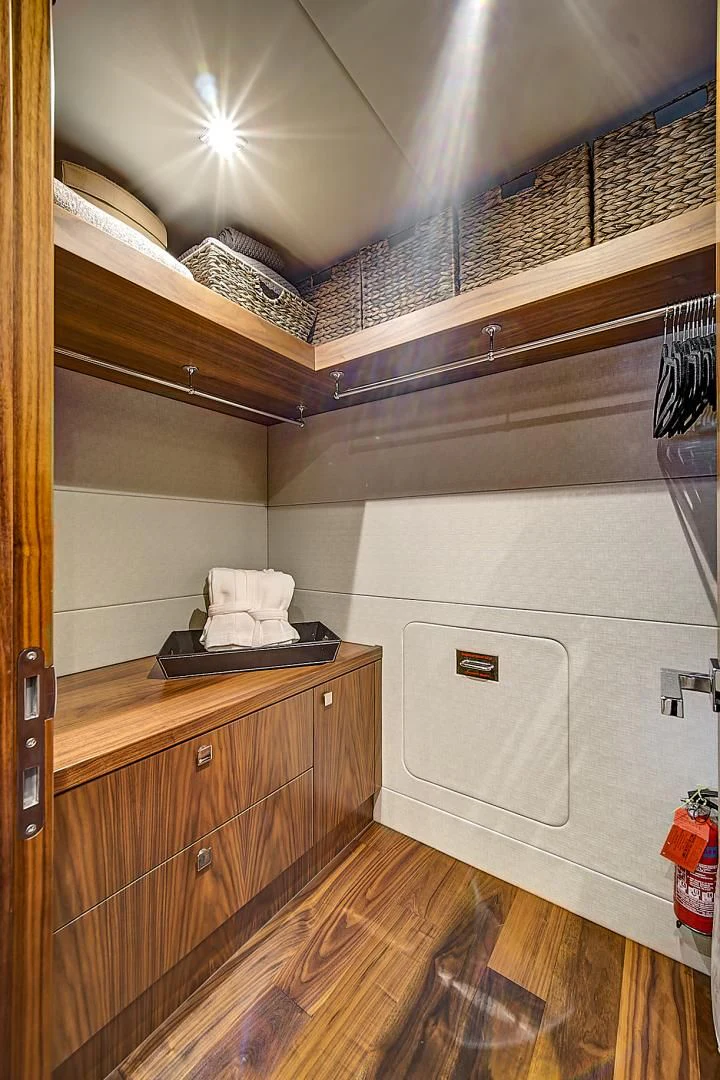 a room with a wood floor and a large white fan aboard 'S NOON SOMEWHERE Yacht for Sale