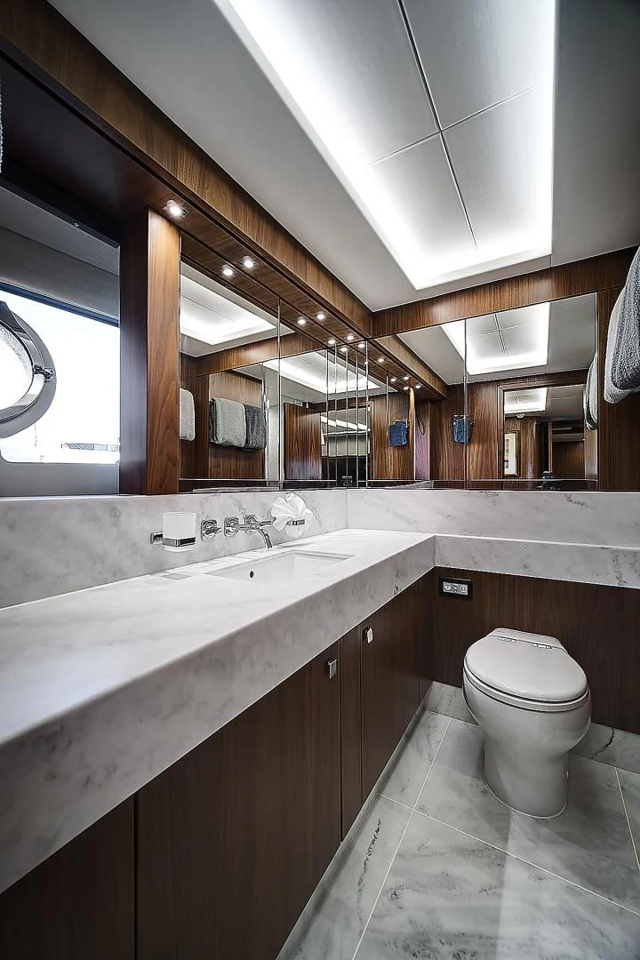 a bathroom with a sink and a toilet aboard 'S NOON SOMEWHERE Yacht for Sale