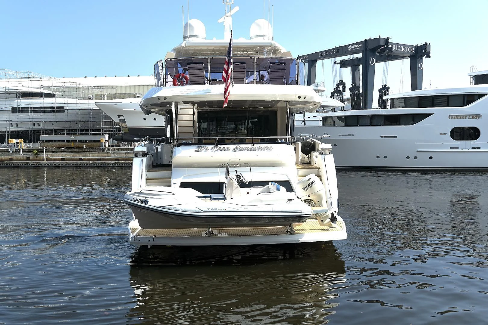a large white boat in the water aboard 'S NOON SOMEWHERE Yacht for Sale