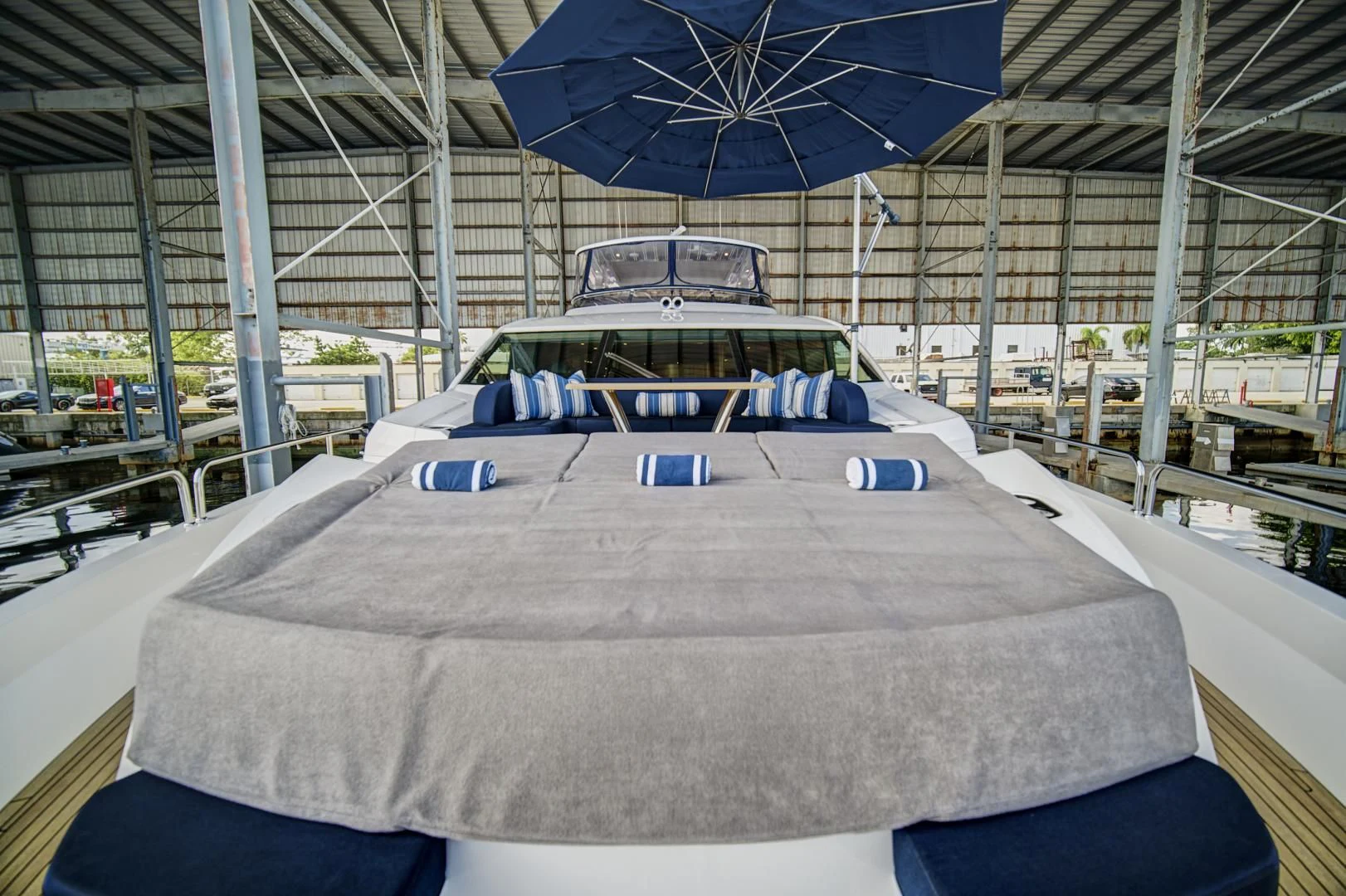 a car parked in a building aboard 'S NOON SOMEWHERE Yacht for Sale