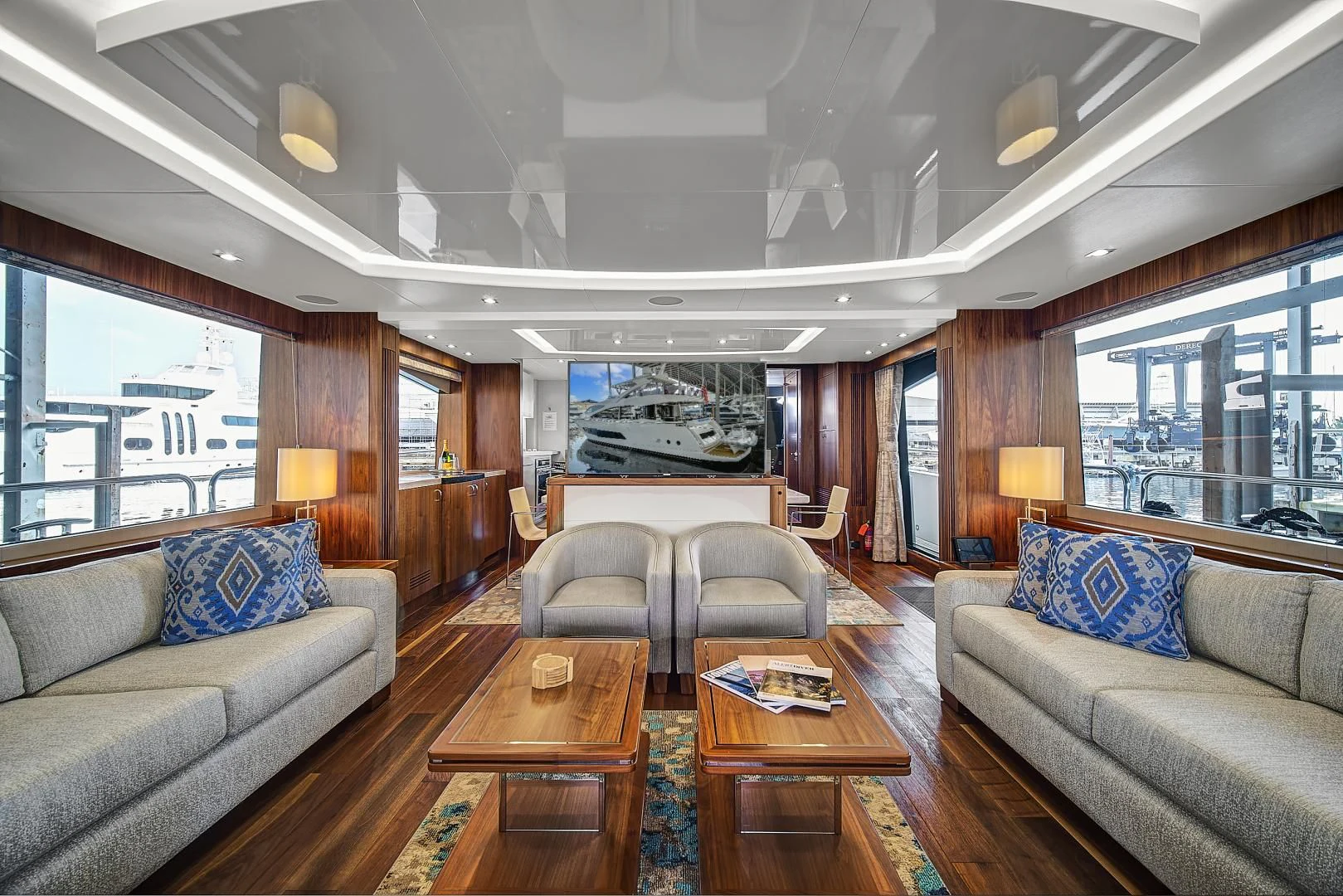 a living room with a large window aboard 'S NOON SOMEWHERE Yacht for Sale