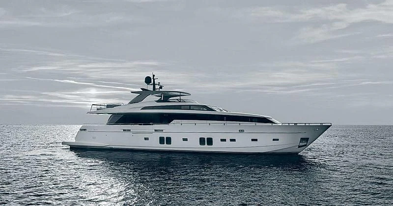 a white yacht in the water aboard NEVER SAY NEVER Yacht for Sale