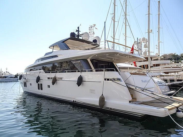 a boat docked at a pier aboard NEVER SAY NEVER Yacht for Sale